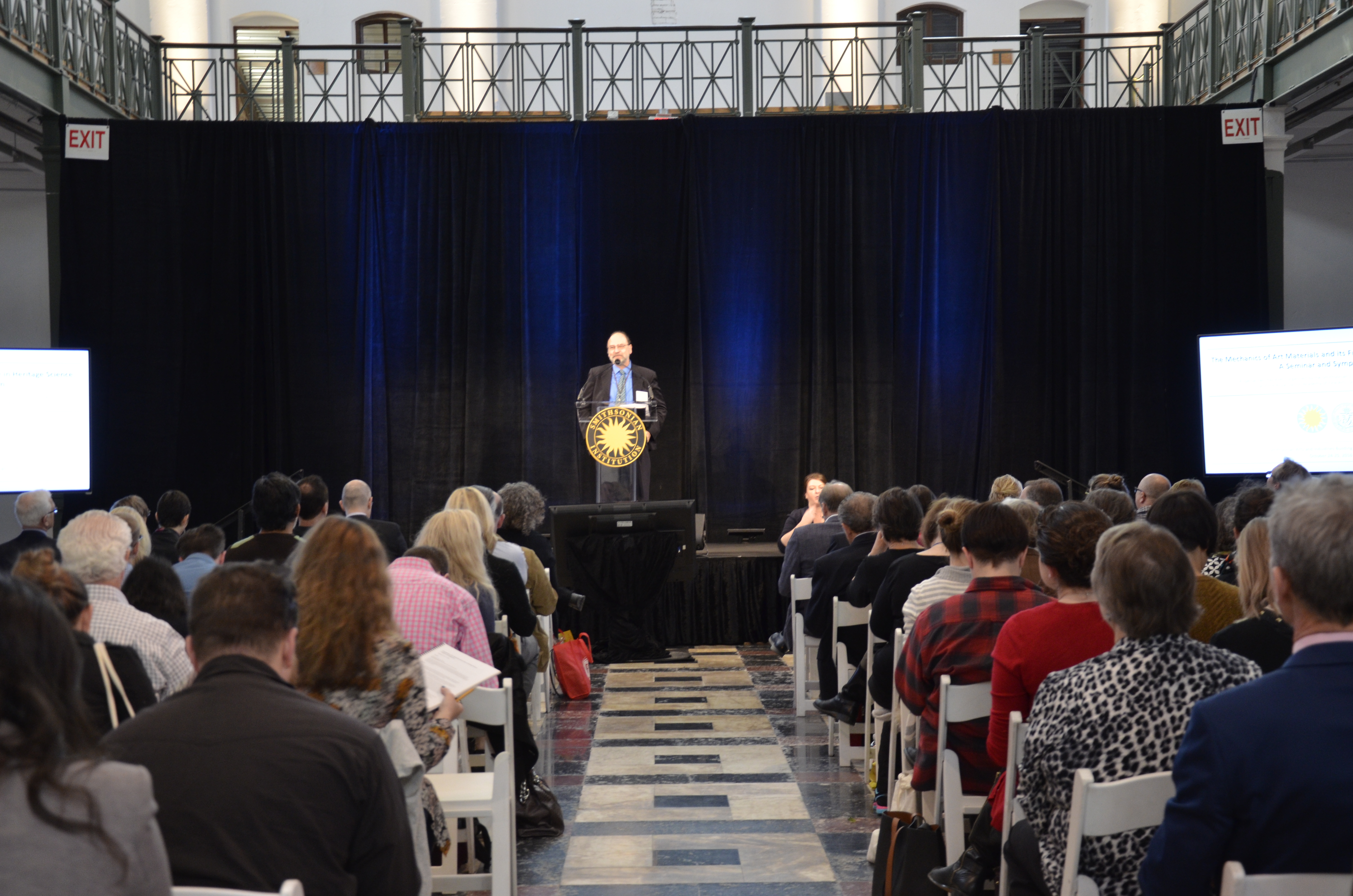 Presentation at symposium to a large crowd