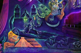 A detail of the western wall of the Alameda's black light murals reveals Spanish ships on their way to conquer the Aztec empire as Cortez looks on. The western wall is better preserved than the paintings on the eastern wall, which have suffered from extensive roof leaks.