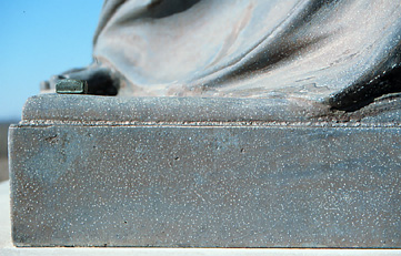 Detail of the previous showing pitting on the base of the Virgin Mary