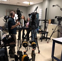 Imaging Scientist and Conservator filming a segment for 60 Minutes at the MCI facility