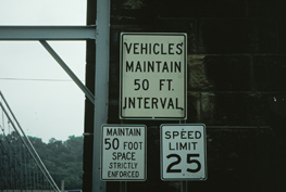 View of the Wheeling Suspension Bridge, modern traffic signs